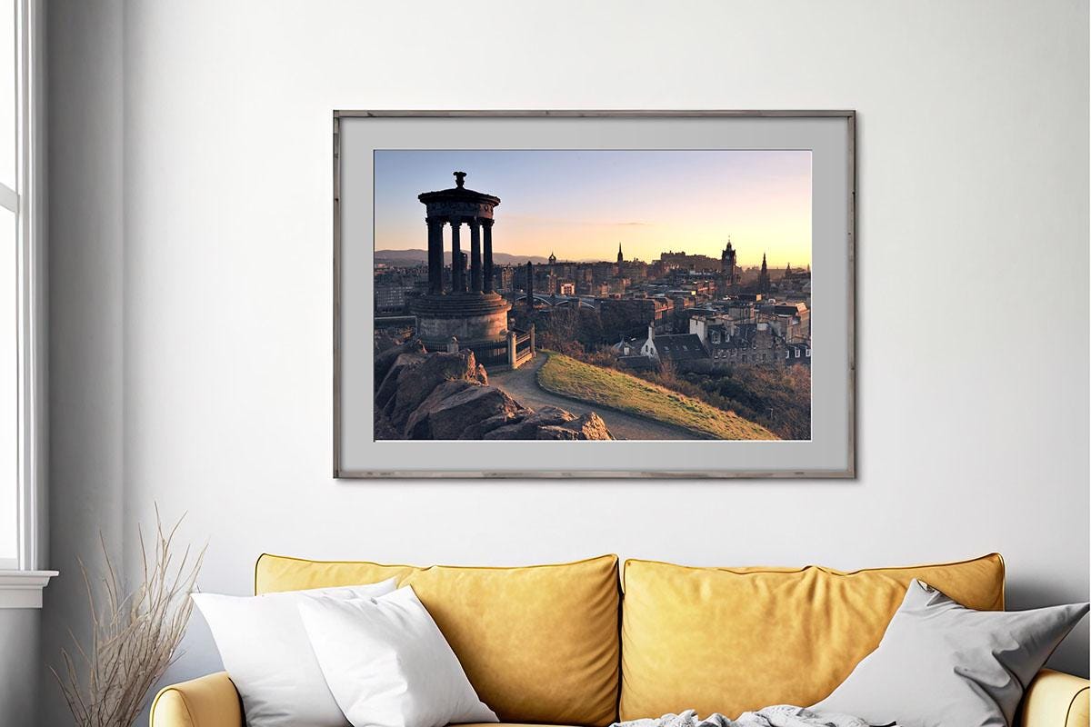 Edinburgh Calton Hill Cityscape in frame on wall above yellow couch