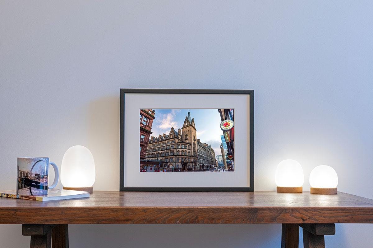 Glasgow Central Clock Tower print in small frame on table